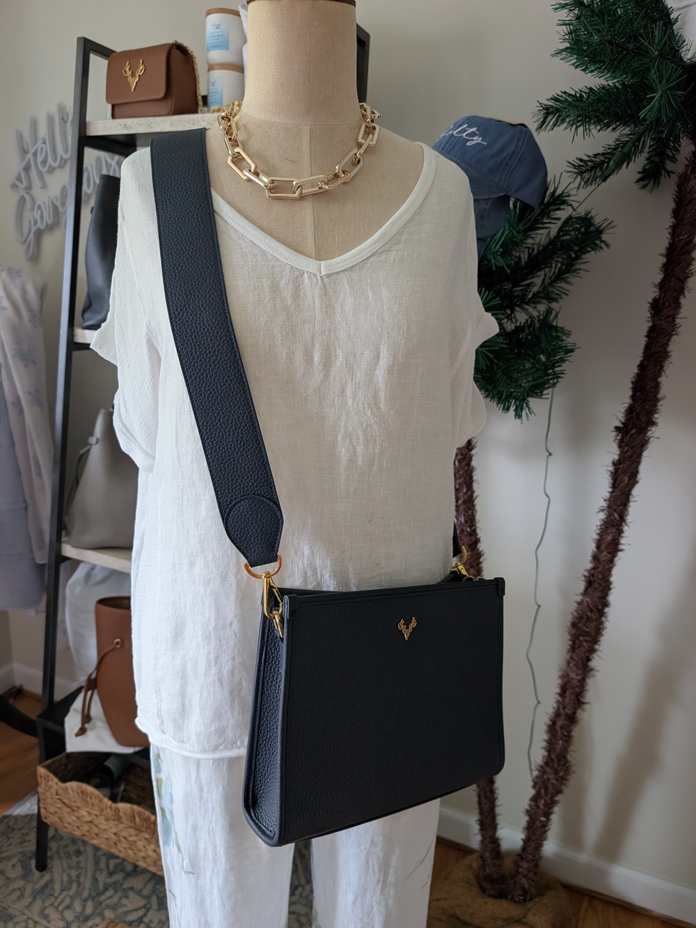Black Crossbody Bag with Wide Strap and Gold Accent